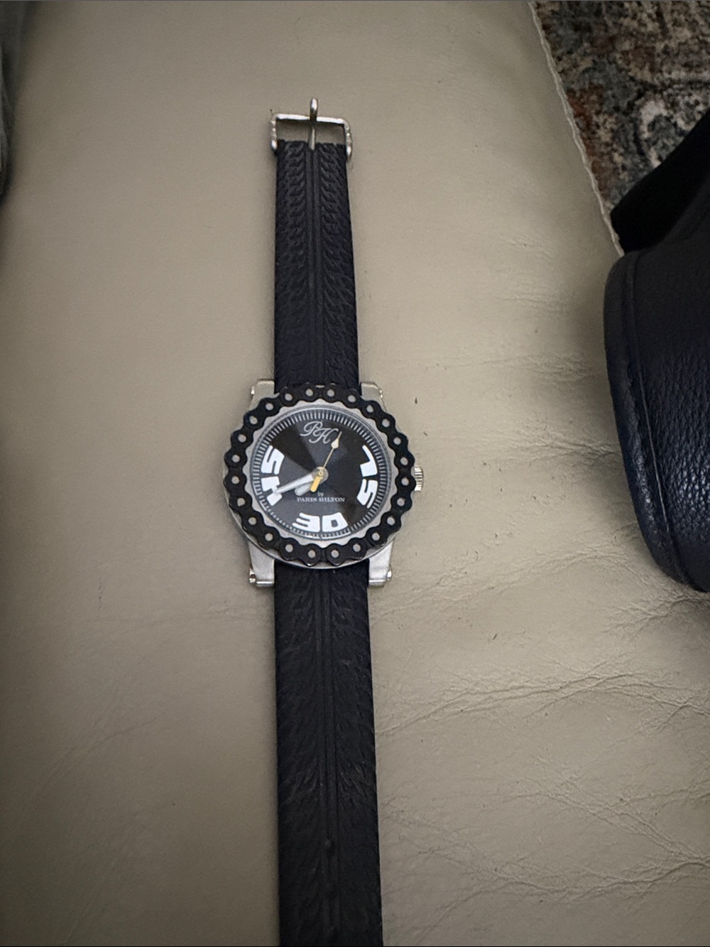 Paris Hilton Black Round Dial Wristwatch with Textured Strap
